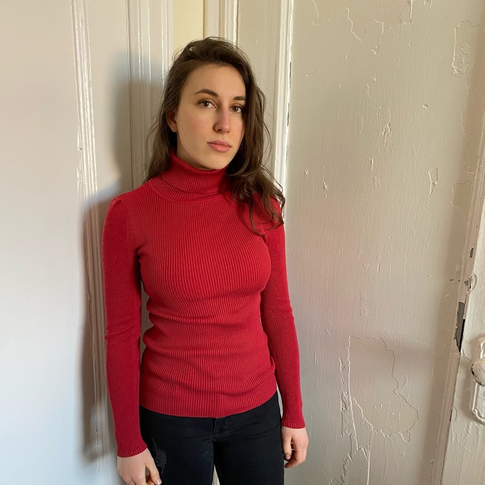 Red turtleneck sweater